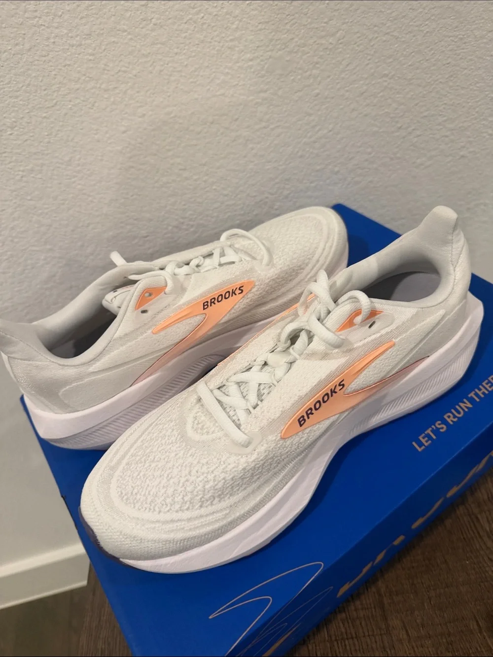 Brooks Revel 9 Women’s White Sneakers with Peach Accent
